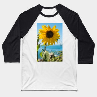 Sunflower field. Sunflower with blue sky and the sea in backgorund. Summer background, bright yellow sunflower over blue sky. Landscape with sunflower field over cloudy blue sky. Baseball T-Shirt